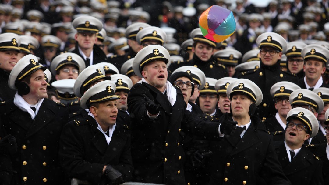 Navy midshipmen hit a beach ball through the crowd before the start of the Army Navy NCAA college football game at Lincoln Financial Field Saturday Dec. 14, 2013 in Philadelphia.