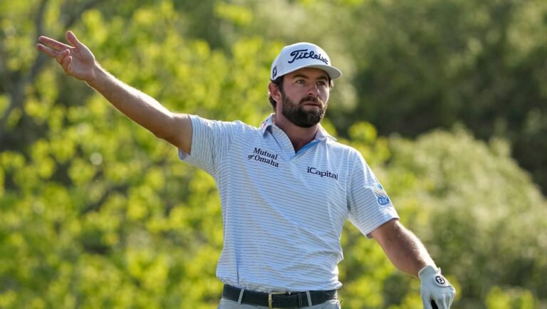 Cameron Young reacts to his drive on the second hole during a semifinal round at the Dell Technologies Match Play Championship golf tournament in Austin, Texas, Sunday, March 26, 2023.