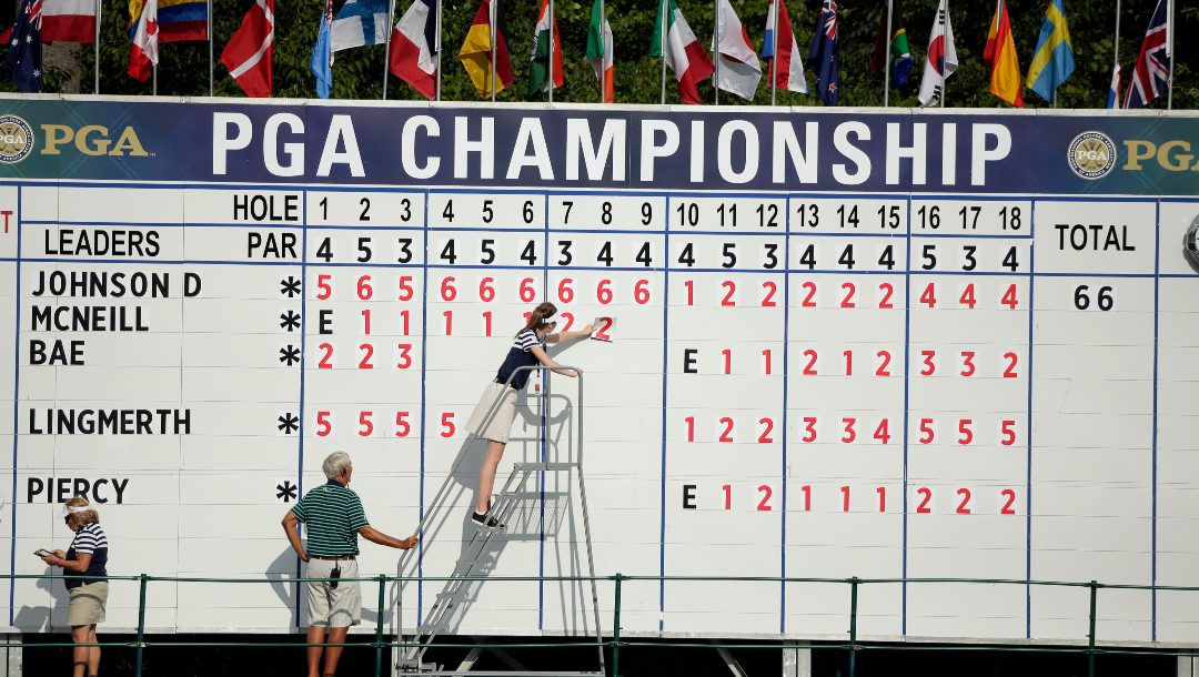 The leaderboard on the 18th hole during the first round of the PGA Championship golf tournament Thursday, Aug. 13, 2015, at Whistling Straits in Haven, Wis.