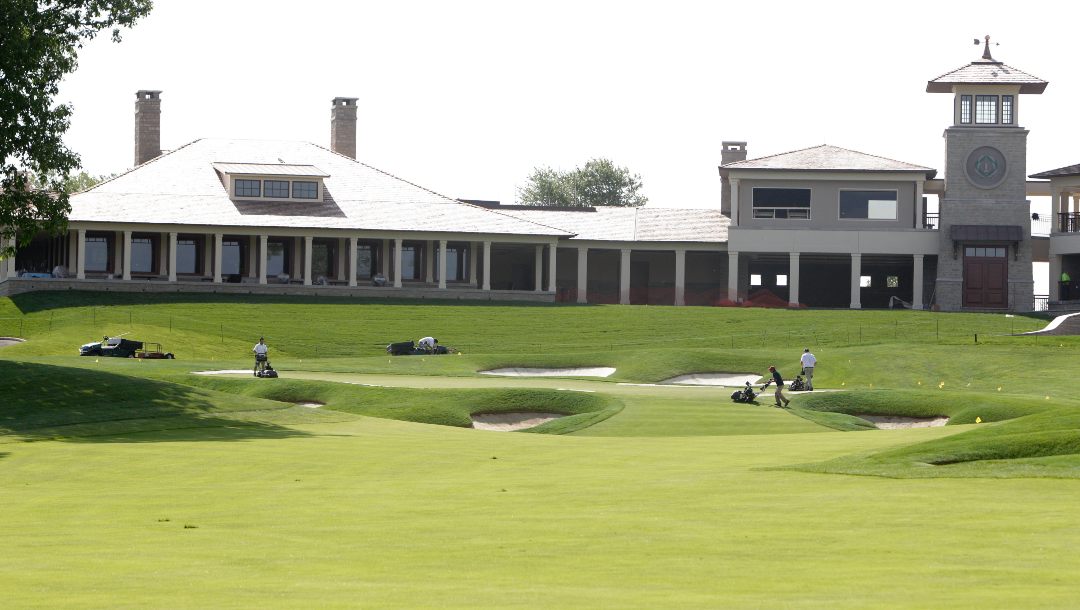This Wednesday, May 22, 2013, file photo shows the clubhouse and 18th fairway at Muirfield Village Golf Club in Dublin, Ohio.