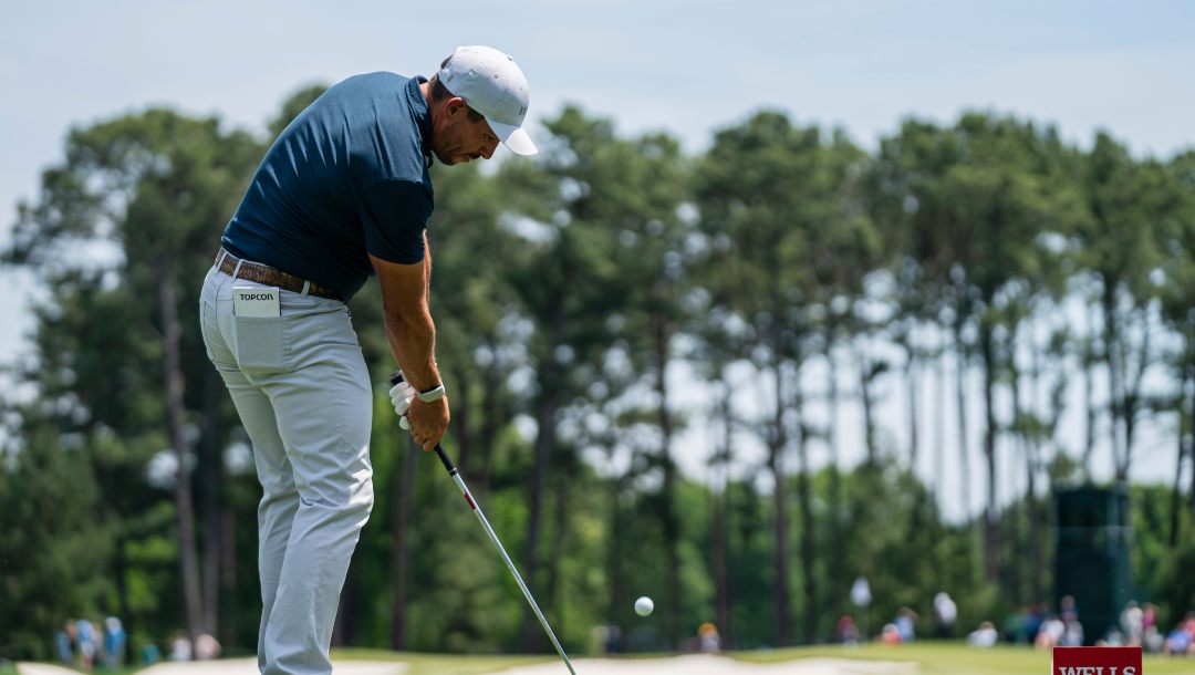 Scott Stallings tees off on the fourth hole during the fourth round of the Wells Fargo Championship golf tournament at Quail Hollow on Sunday, May 9, 2021, in Charlotte, N.C.