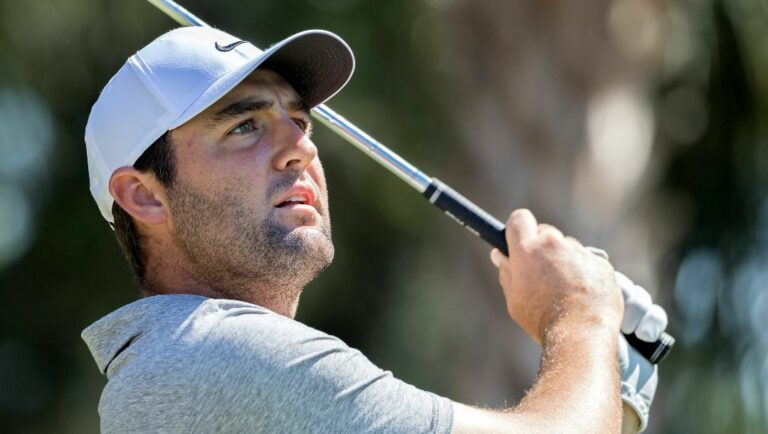Scottie Scheffler watches his drive off the 11th tee during the third round of the RBC Heritage golf tournament, Saturday, April 15, 2023, in Hilton Head Island, S.C.