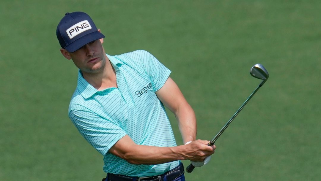 Taylor Moore chips to the green on the second hole during the first round of the Masters golf tournament at Augusta National Golf Club on Thursday, April 6, 2023, in Augusta, Ga.