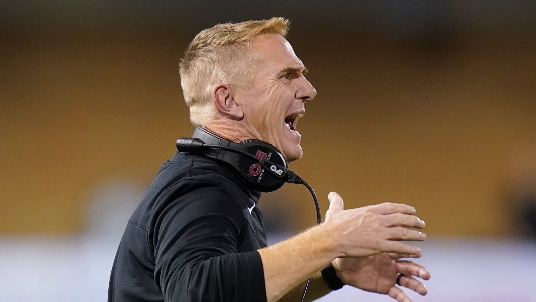 FILE - Utah State head coach Blake Anderson shouts to his team in the first half during an NCAA college football game against BYU on Oct. 1, 2021, in Logan, Utah. The No. 19 San Diego State Aztecs have called the Los Angeles suburbs their home for two seasons while they're building a new stadium in Mission Valley. They'll host Utah State in the Mountain West Conference championship game Saturday in Carson. (AP Photo/Rick Bowmer, File)