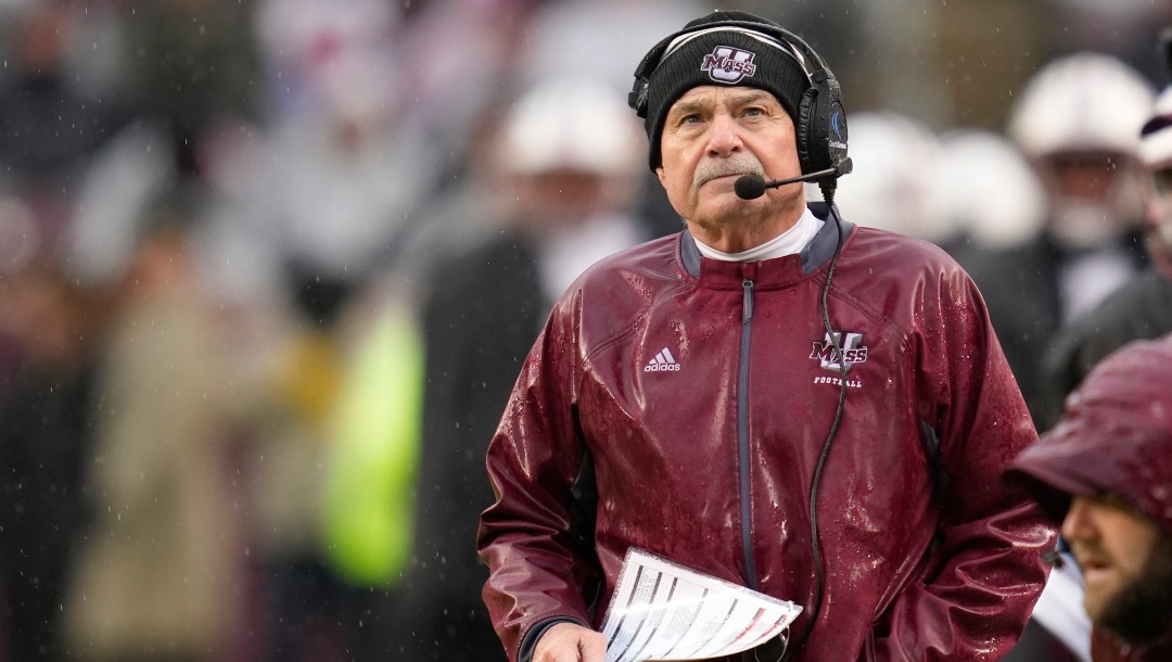 Massachusetts head coach Don Brown watches a replay against Texas A&M during the first quarter of an NCAA college football game Saturday, Nov. 19, 2022, in College Station, Texas. (AP Photo/Sam Craft)