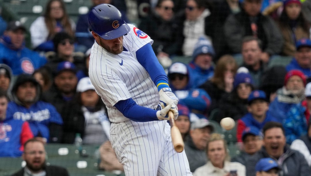 Chicago Cubs' Patrick Wisdom hits a ball during the ninth inning of a baseball game against the Los Angeles Dodgers in Chicago, Sunday, April 23, 2023. The Dodgers won 7-3.