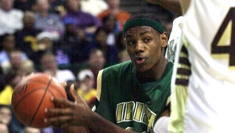 Akron St. Vincent-St. Mary's LeBron James drives toward the basket against Brush players Sunday, January 13, 2002 at the Cleveland Convocation Center in Cleveland. James is being called everything from the Second Coming of Michael Jordan or Kobe Bryant to the greatest player in high school history.