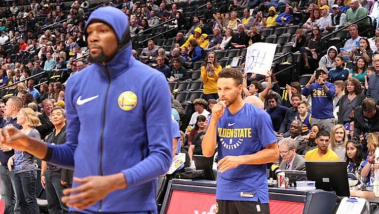 Stephen Curry and Kevin Durant practice prior to the start of a game in Denver, Colorado in November 2017.