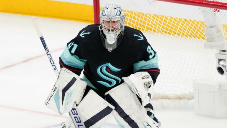 Seattle Kraken goaltender Philipp Grubauer (31) looks on against the Colorado Avalanche during overtime in Game 4 of an NHL hockey Stanley Cup first-round playoff series Monday, April 24, 2023, in Seattle. The Kraken won 3-2 in overtime. (AP Photo/Lindsey Wasson)