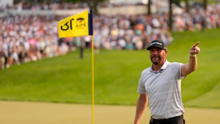 Michael Block acknowledges the crowd on the 18th hole after his final round of the PGA Championship golf tournament at Oak Hill Country Club on Sunday, May 21, 2023, in Pittsford, N.Y. (AP Photo/Seth Wenig)