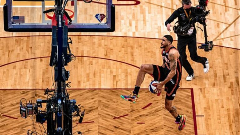 Obi Toppin of the New York Knicks performs his dunk during the 2022 NBA All-Star Weekend Slam Dunk competition.