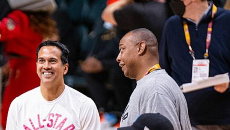 Miami Heat head coach Erik Spoelstra talks with his assistant coach Caron Butler during the 2022 NBA All-Star Weekend.