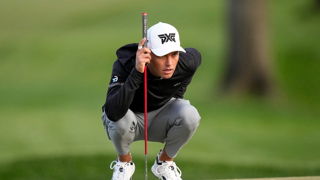 Eric Cole lines up a putt on the fourth hole during the first round of the PGA Championship golf tournament at Oak Hill Country Club on Thursday, May 18, 2023, in Pittsford, N.Y.