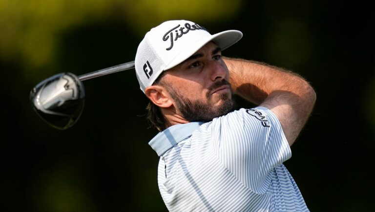 Max Homa watches his tee shot on the sixth hole during the first round of the PGA Championship golf tournament at Oak Hill Country Club on Thursday, May 18, 2023, in Pittsford, N.Y.