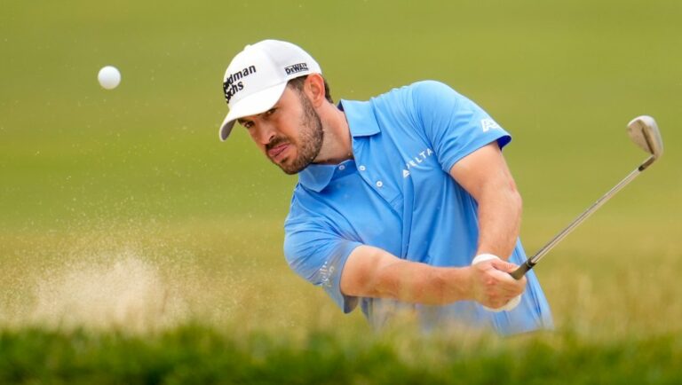 Patrick Cantlay hits from the bunker on the first hole during the final round of the U.S. Open golf tournament at Los Angeles Country Club on Sunday, June 18, 2023, in Los Angeles.