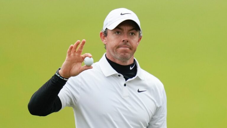 Rory McIlroy, of Northern Ireland, waves after his putt on the 18th hole during the third round of the PGA Championship golf tournament at Oak Hill Country Club on Saturday, May 20, 2023, in Pittsford, N.Y.