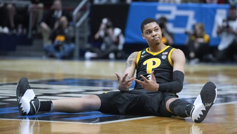 Pittsburgh's Greg Elliott reacts after hitting a 3-point shot and being fouled during the first half of the team's First Four game against Mississippi State in the NCAA men's college basketball tournament Tuesday, March 14, 2023, in Dayton, Ohio.