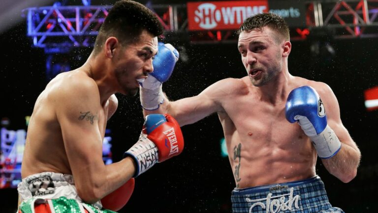 Josh Taylor, of Scotland, hits Alfonso Olvera, of Mexico, during their super lightweight boxing match, Saturday, Jan. 28, 2017.