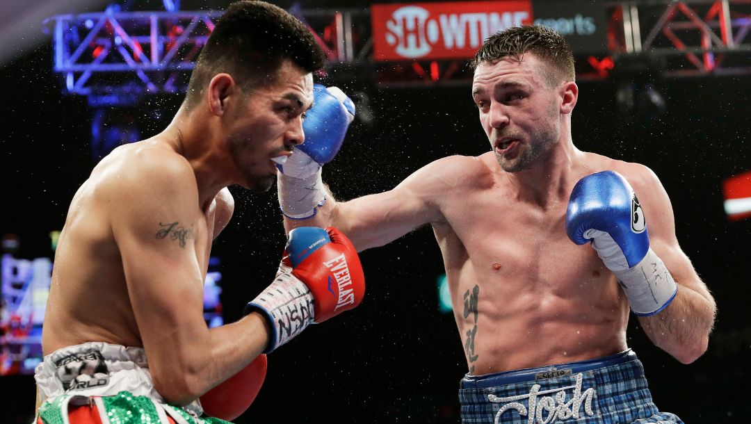 Josh Taylor, of Scotland, hits Alfonso Olvera, of Mexico, during their super lightweight boxing match, Saturday, Jan. 28, 2017.