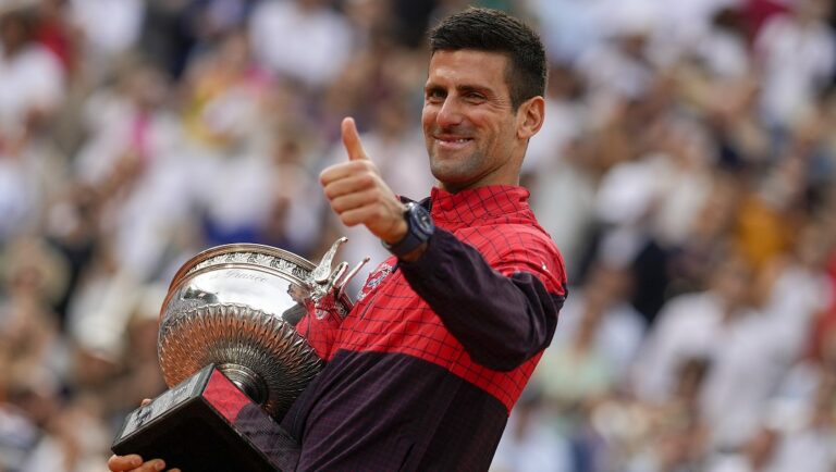 Serbia's Novak Djokovic celebrates winning the men's singles final match of the French Open tennis tournament against Norway's Casper Ruud in three sets, 7-6, (7-1), 6-3, 7-5, at the Roland Garros stadium in Paris, Sunday, June 11, 2023. Djokovic won his record 23rd Grand Slam singles title, breaking a tie with Rafael Nadal for the most by a man.