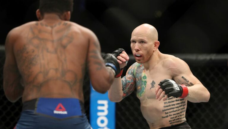 Josh Emmett, right, in action against Michael Johnson during their mixed martial arts bout at UFC Fight Night.