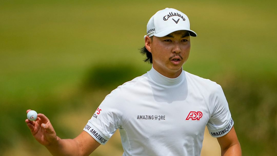 Min Woo Lee waves after his putt on the sixth hole during the final round of the U.S. Open golf tournament at Los Angeles Country Club on Sunday, June 18, 2023, in Los Angeles.