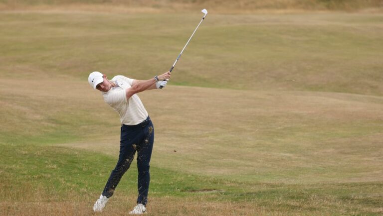 Rory McIlroy of Northern Ireland plays a shot on the 5th fairway during the final round of the British Open golf championship on the Old Course at St. Andrews, Scotland, Sunday July 17, 2022.