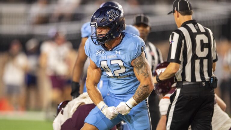 Old Dominion linebacker Jason Henderson (42) celebrates after a tackle during an NCAA college football game on Friday, Sept. 2, 2022, in Norfolk, Va.