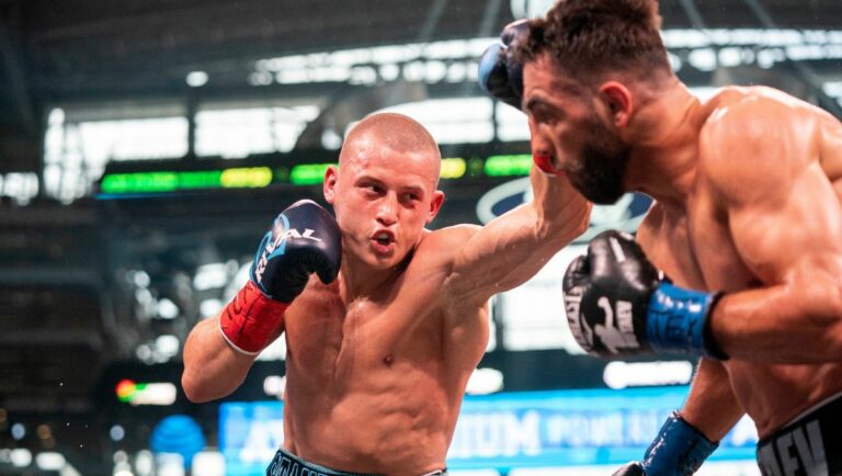Eimantas Stanionis, left, from Lithuania, punches Radzhab Butaev, from Russia, during an undercard fight.