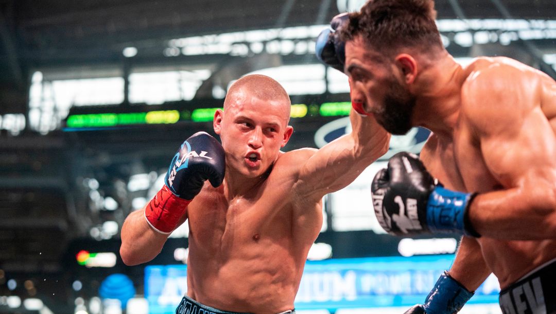 Eimantas Stanionis, left, from Lithuania, punches Radzhab Butaev, from Russia, during an undercard fight.