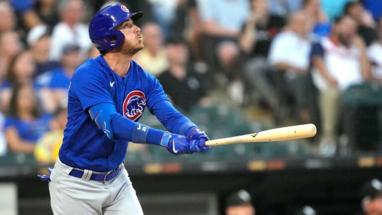 Chicago Cubs' Cody Bellinger watches his fly ball during a baseball game against the Chicago White Sox Tuesday, July 25, 2023, in Chicago.