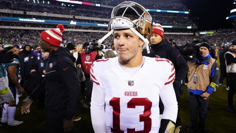 San Francisco 49ers quarterback Brock Purdy walks on the field after the NFC Championship NFL football game between the Philadelphia Eagles and the San Francisco 49ers on Sunday, Jan. 29, 2023, in Philadelphia. The Eagles won 31-7. NFL teams will be allowed to play an emergency quarterback from the inactive list if the first two are injured during a game, a rule change approved by league owners on Monday, May 22, 2023, that stemmed from San Francisco's depth-chart challenge in the NFC championship game.