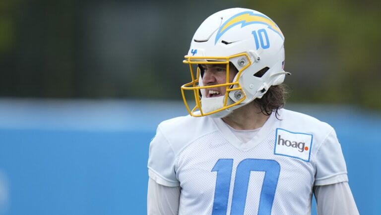 Los Angeles Chargers quarterback Justin Herbert (10) walks on the field during NFL football practice in Costa Mesa, Calif., Wednesday, June 14, 2023.