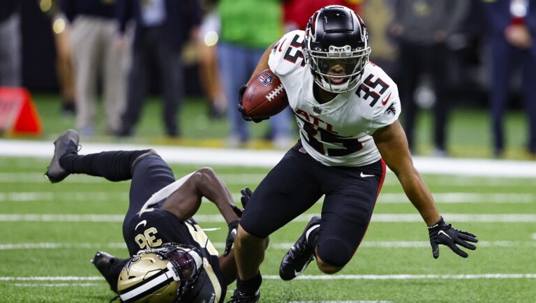 Atlanta Falcons' Avery Williams (35) breaks away from New Orleans Saints cornerback Isaac Yiadom (36) in the second half of an NFL football game in New Orleans, Sunday, Dec. 18, 2022. Falcons running back and return specialist Avery Williams is expected to miss the 2023 season after suffering a knee injury in a non-contact drill. Falcons coach Arthur Smith said Wednesday, June 7, 2023, Williams is expected to have season-ending surgery on Thursday to repair a torn anterior cruciate ligament.