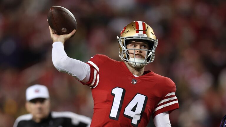 San Francisco 49ers quarterback Sam Darnold (14) passes against the Baltimore Ravens during the second half of an NFL football game Monday, Dec. 25, 2023, in Santa Clara, Calif. (AP PhotoJed Jacobsohn)