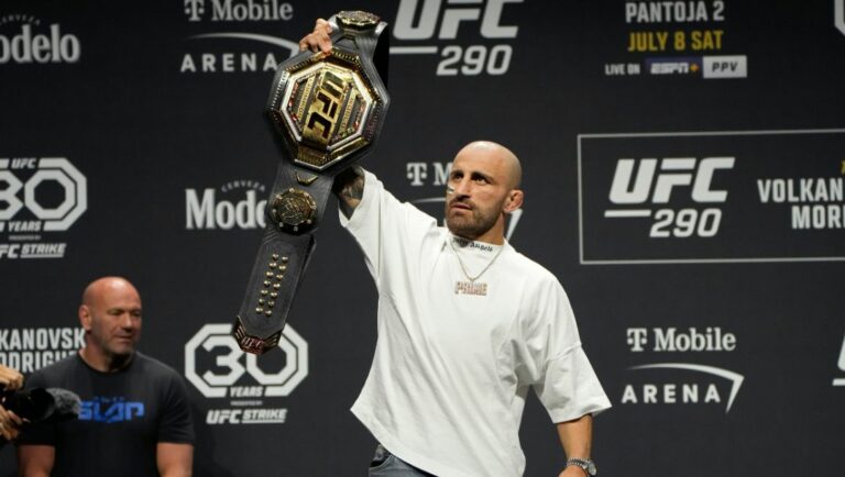 Alexander Volkanovski celebrates during a news conference for the UFC 290 Mixed Martial arts event Thursday, July 6, 2023.