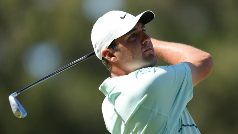Scottie Scheffler watches his tee shot on the seventh hole during the third round of the U.S. Open golf tournament at Los Angeles Country Club on Saturday, June 17, 2023, in Los Angeles.