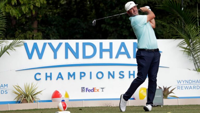 Scott Piercy hits his tee shot on the second hole during the third round of the Wyndham Championship golf tournament at Sedgefield Country Club in Greensboro, N.C., Saturday, Aug. 14, 2021.
