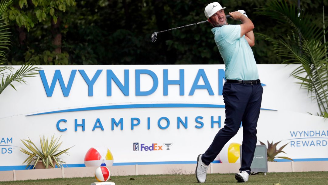 Scott Piercy hits his tee shot on the second hole during the third round of the Wyndham Championship golf tournament at Sedgefield Country Club in Greensboro, N.C., Saturday, Aug. 14, 2021.