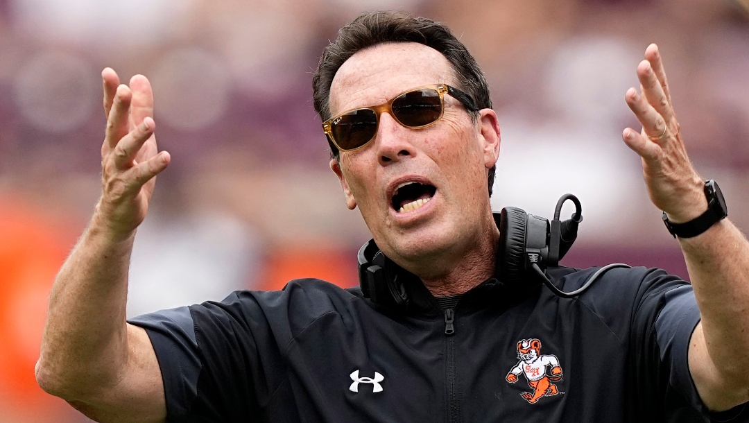 Sam Houston State coach K.C. Keeler yells toward the officials during the first half of an NCAA college football game against Texas A&M Saturday, Sept. 3, 2022, in College Station, Texas. (AP Photo/David J. Phillip)