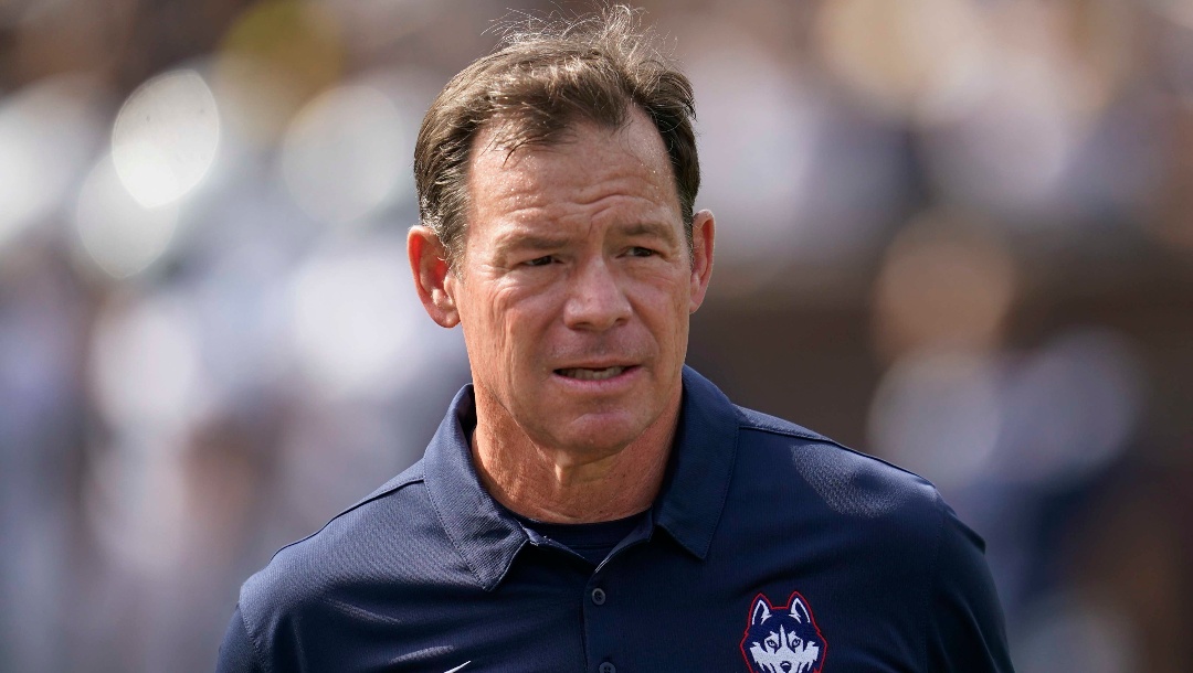 Connecticut head coach Jim Mora watches before an NCAA college football game against Michigan in Ann Arbor, Mich., Saturday, Sept. 17, 2022. (AP Photo/Paul Sancya)