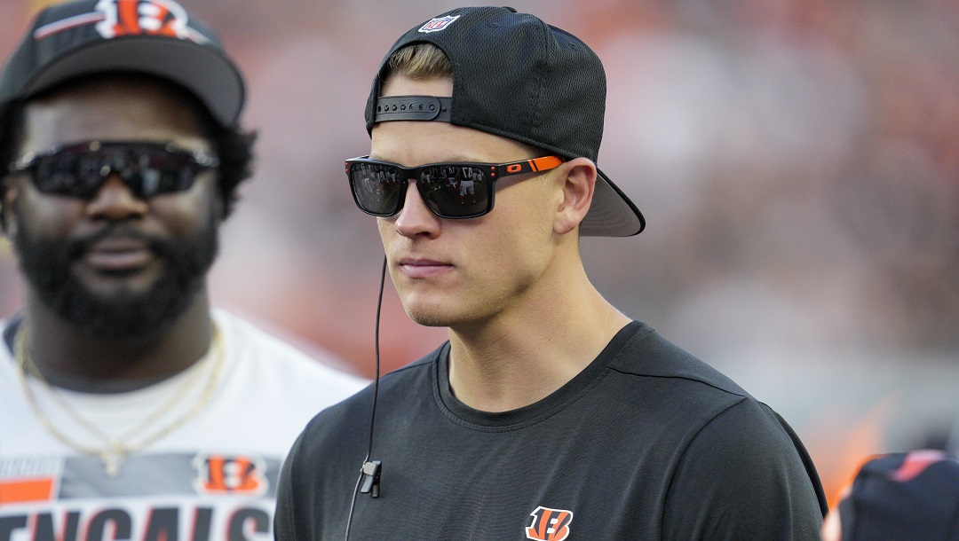 Cincinnati Bengals quarterback Joe Burrow stands on the sidelines during a preseason NFL football game against the Green Bay Packers Friday, Aug. 11, 2023, in Cincinnati.