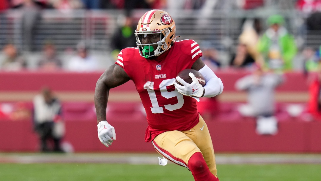 San Francisco 49ers wide receiver Deebo Samuel (19) runs against the Seattle Seahawks during the first half of an NFL wild card playoff football game in Santa Clara, Calif., Saturday, Jan. 14, 2023. (AP Photo/Godofredo A. Vásquez)