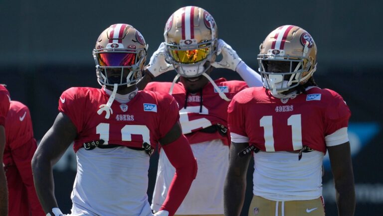 San Francisco 49ers wide receivers Deebo Samuel, left, Danny Gray, middle, and Brandon Aiyuk (11) take part in drills during the NFL team's football training camp in Santa Clara, Calif., Tuesday, Aug. 1, 2023. (AP Photo/Jeff Chiu)