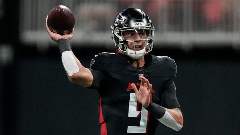 Atlanta Falcons quarterback Desmond Ridder (9) works against the Cincinnati Bengals during the first half of an NFL preseason football game, Friday, Aug. 18, 2023, in Atlanta. (AP Photo/Brynn Anderson)