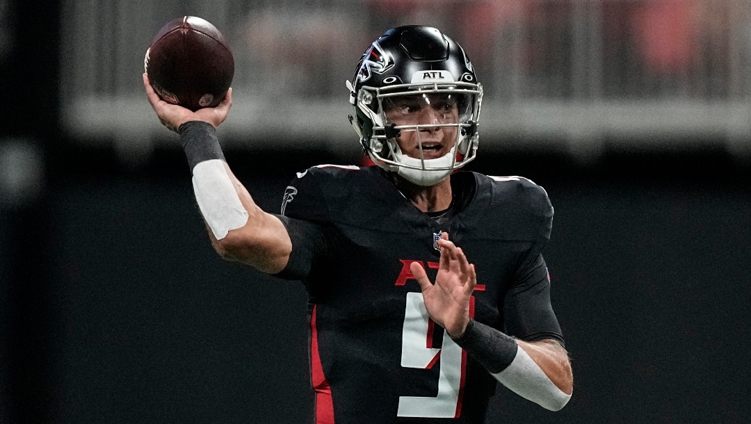 Atlanta Falcons quarterback Desmond Ridder (9) works against the Cincinnati Bengals during the first half of an NFL preseason football game, Friday, Aug. 18, 2023, in Atlanta. (AP Photo/Brynn Anderson)