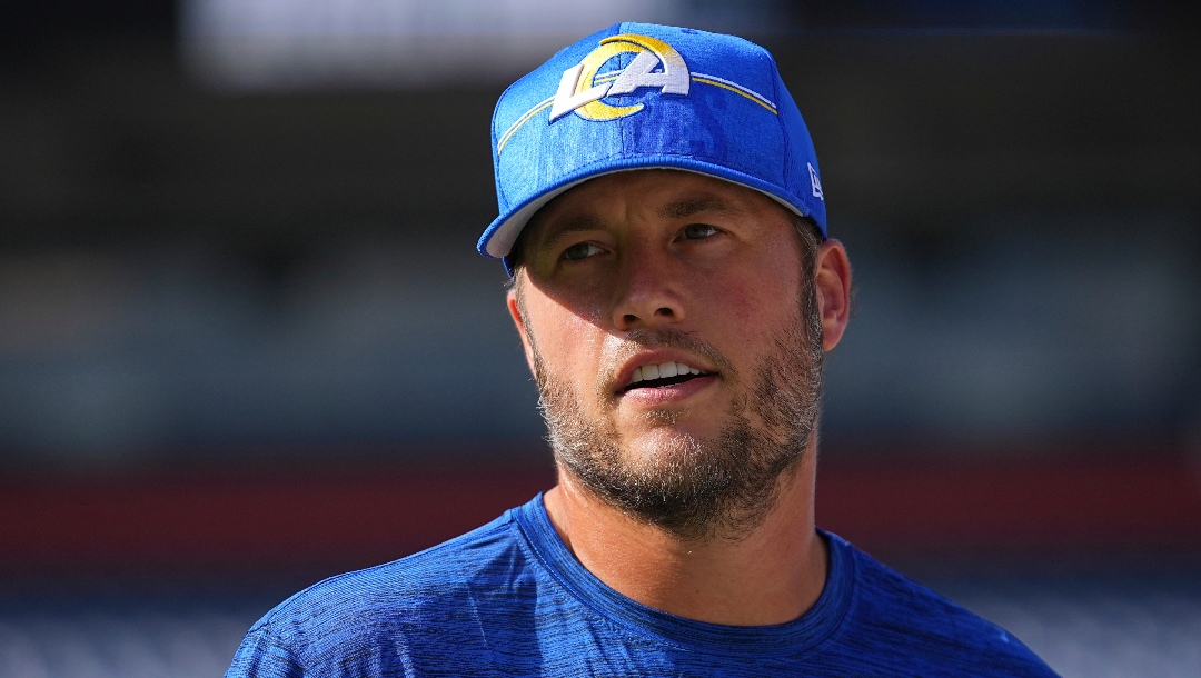 Los Angeles Rams quarterback Matthew Stafford (9) warms up prior to the game against the Denver Broncos of an NFL football game Saturday, Aug 26, 2023, in Denver. (AP Photo/Bart Young)