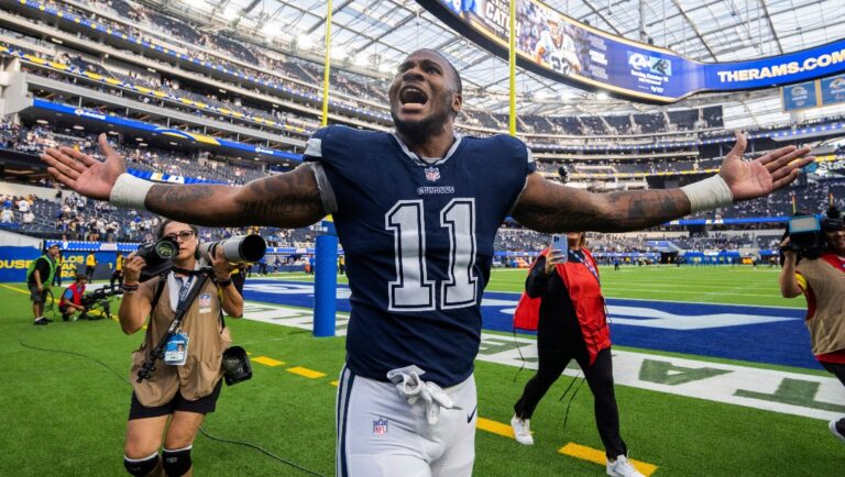 FILE - Dallas Cowboys linebacker Micah Parsons (11) gestures to fans after the team's NFL football game against the Los Angeles Rams on Oct. 9, 2022, in Inglewood, Calif. San Francisco 49ers edge rusher Nick Bosa, Chiefs defensive tackle Chris Jones and Parsons are the finalists for AP Defensive Player of the Year. (AP Photo/Kyusung Gong)