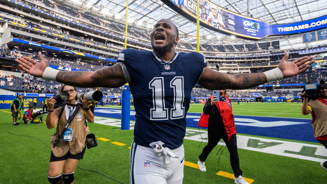 FILE - Dallas Cowboys linebacker Micah Parsons (11) gestures to fans after the team's NFL football game against the Los Angeles Rams on Oct. 9, 2022, in Inglewood, Calif. San Francisco 49ers edge rusher Nick Bosa, Chiefs defensive tackle Chris Jones and Parsons are the finalists for AP Defensive Player of the Year. (AP Photo/Kyusung Gong)