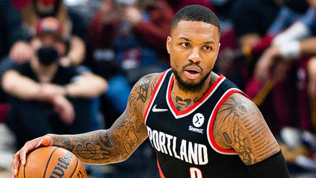 Damian Lillard of the Portland Trail Blazers dribbling the ball during an NBA game in November 2021.